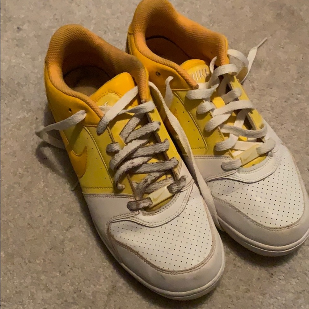 Yellow and white Nike’s